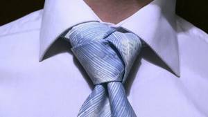 Как завязать галстук узлом тринити?